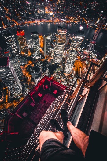 Casually hanging on the spire of Jin Mao Tower, 23rd tallest building in the world and 3rd tallest building in Shanghai.