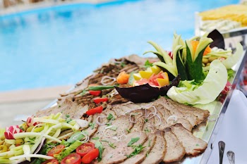 catering buffet food outdoor in luxury restaurant with meat and colorful fruits