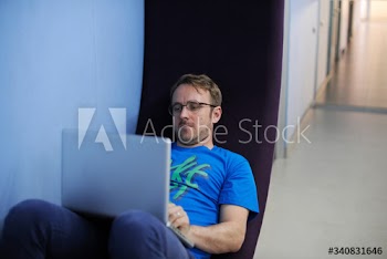 Caucasian man using computer laptop