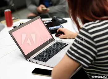 Caucasian woman using computer