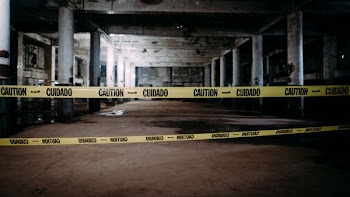 caution tapes in front of building