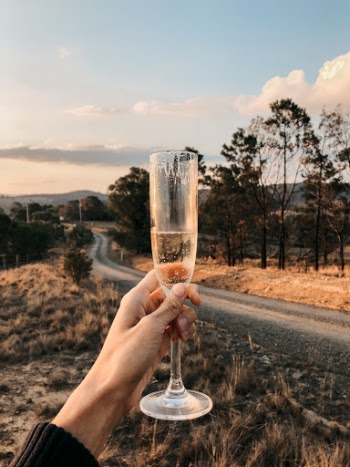 Celebrating a friend's birthday with champagne in a beautiful and rural part of NSW, Australia.