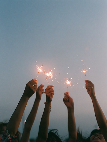 Celebration of Summer: Hands Holding Sparklers at Dusk