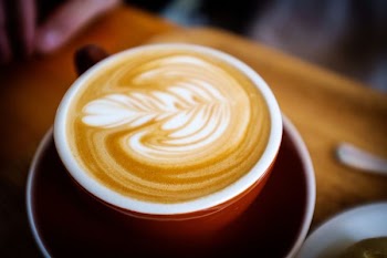 ceramic coffee mug filled with coffee