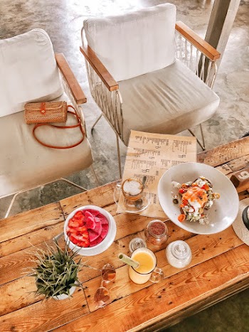 Chairs Beside Table With Foods and Beverages