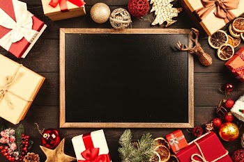 Chalkboard Surrounded By Christmas Gifts