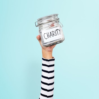 Charity money jar for donation campaign | Free stock photo | High Resolution image