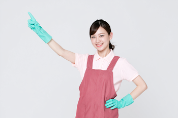 Cheerful Asian Cleaning Worker in Studio Portrait