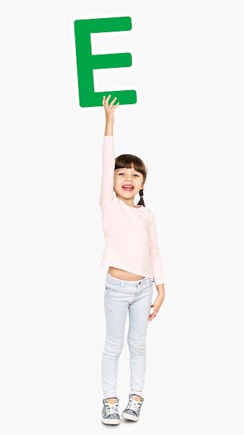 Cheerful girl holding the letter E | Free stock psd mockup - 491814