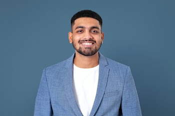 Cheerful Indian businessman smiling closeup… | Free stock photo | High Resolution image