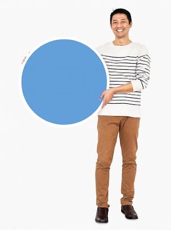 Cheerful man holding a blank blue circle | Free stock psd mockup - 491046