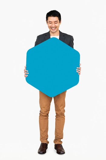 Cheerful man showing a blank blue hexagon sha.. | Free stock psd mockup - 491070