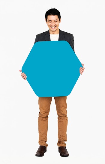 Cheerful man showing a blank blue hexagon sha.. | Free stock psd mockup - 491186