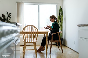 Cheerful woman in a video call while working from home during coronavi.. | Free  photo - 2310141