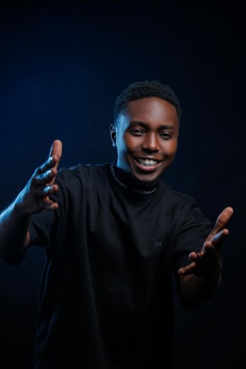 Cheerful Young Man with Open Arms