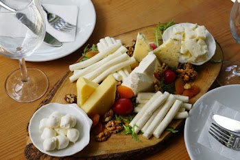 Cheese on Brown Wooden Chopping Board