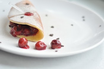 Cherry Crepe Dish on Round White Ceramic Plate