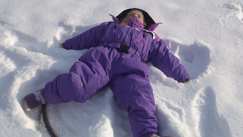 Child Playing in Snow, Little Girl Making Angels in Snow in Winter ...