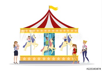 Children having fun on the merry go round
