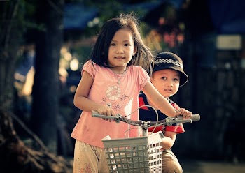 Children Riding Bicycle