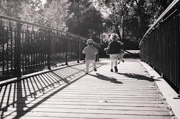 Children Running Together on Wooden Path Way Bridge