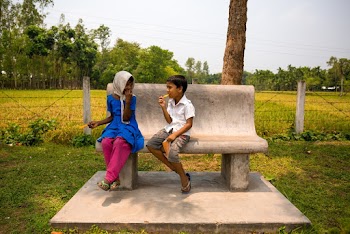 Children Sitting on Bench