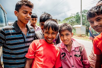 Children Standing Near Vehicle