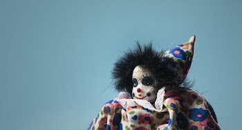 Childs Toy Clown On Blue