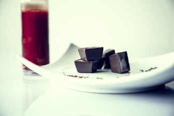 Chocolate Bars on White Ceramic Plate