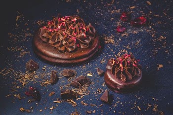 chocolate cookie on blue surface
