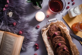 Chocolate Cookies Beside Cup of Drink