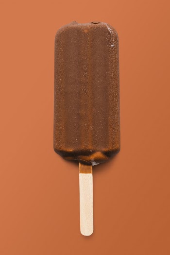 Chocolate glazed ice cream on orange | Free Photo - rawpixel