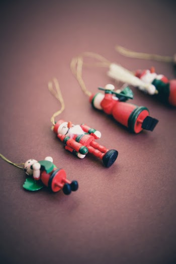 Christmas Nutcracker on Top of Red Textile