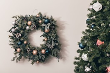 Christmas Wreath Hung By The Tree With Care