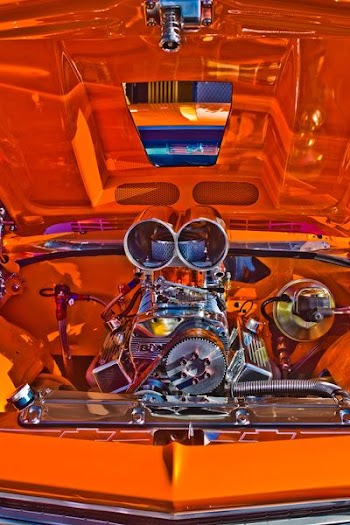 chrome engine bay in orange car