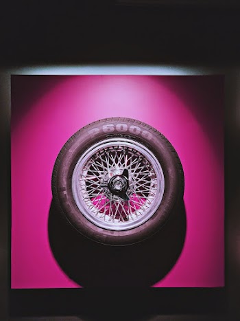 Chrome Multi-spoke Car Wheel and Tire Screenshot
