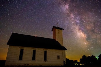 church near trees during night