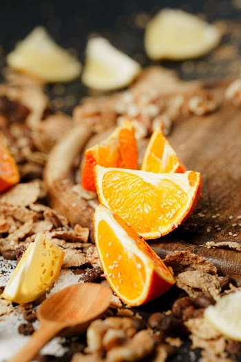 Citrus Fruits and Spices on Rustic Table