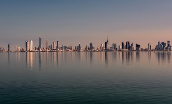 City And Sea During Day