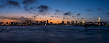 City Buildings Beside Blue Sea