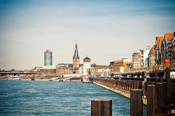 City Buildings Beside Body of Water