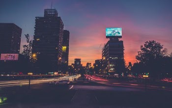 city buildings during sunset