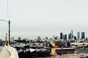 City Buildings Under White Clouds