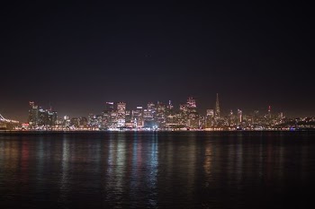 city skyline during night time