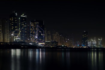 City Skyline Under Dark Sky