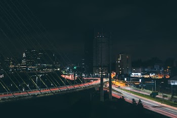 City With High-rise Buildings during Night Time