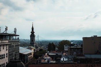 Cityscape Photo Under Blue and White Sky