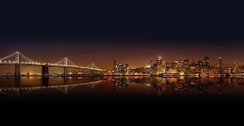 cityscape photography of lighted city with bridge