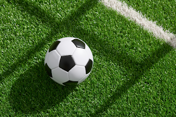 Classic Black and White Soccer Ball on Artificial Turf