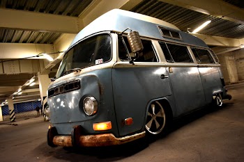 Classic Blue and White Van Parked Inside Building